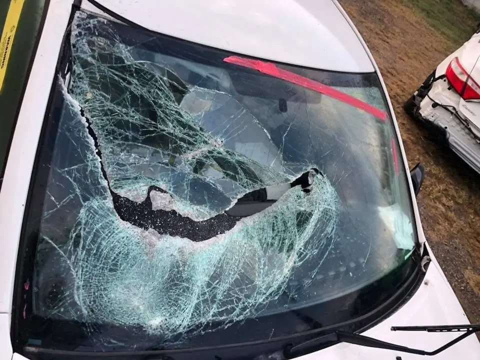 Car windscreen badly smashed by an impact, beyond repair