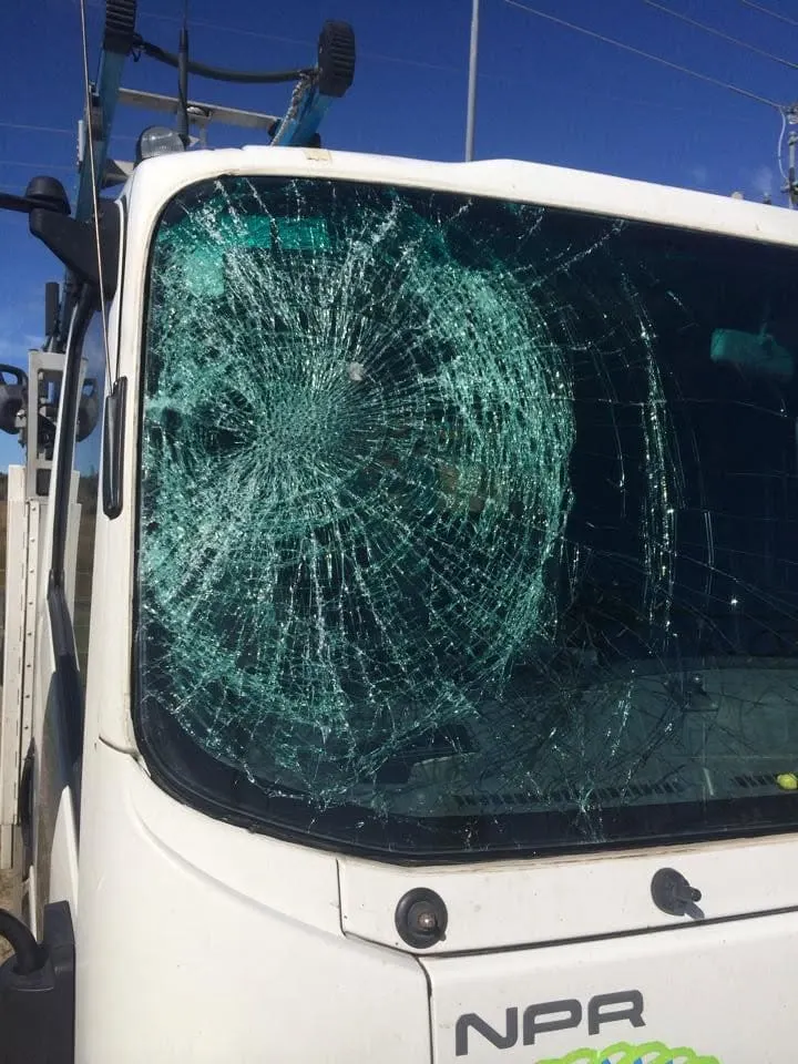 Smashed windscreen on a tradesman’s work truck before replacement